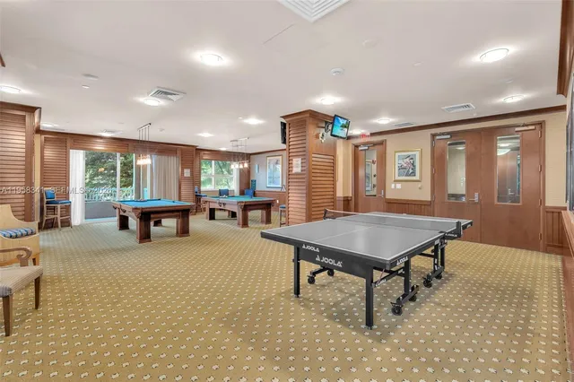 a view of a swimming pool with a garden