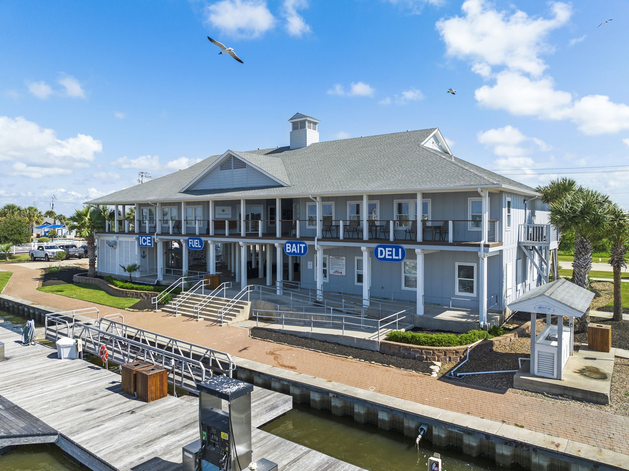 5 Largo Hitchcock, TX 77563 - Photo 17 of 22 a view of a house with pool and chairs