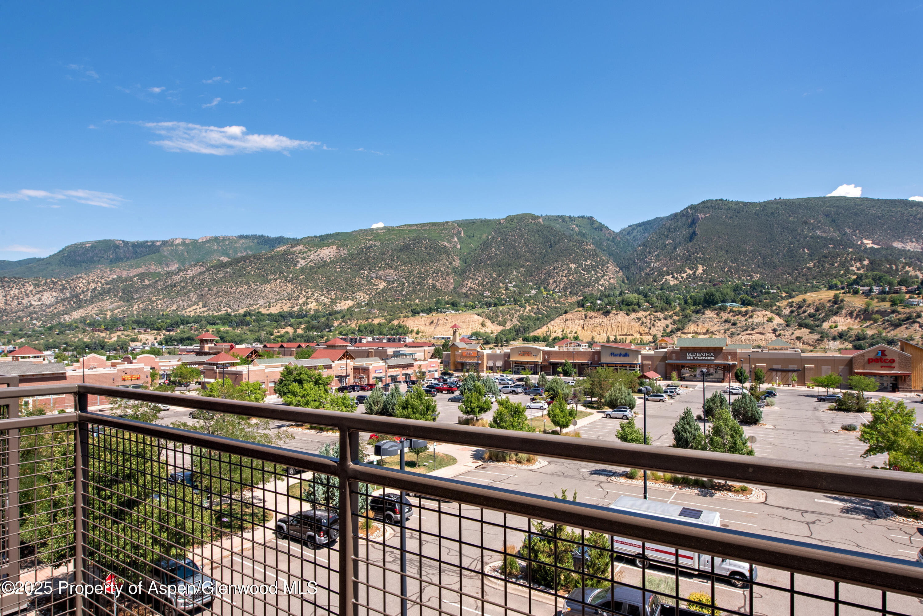 253 Wulfsohn Road, Unit 324 Glenwood Springs, CO 81601 - Photo 10 of 45 a view of city and mountain from a balcony