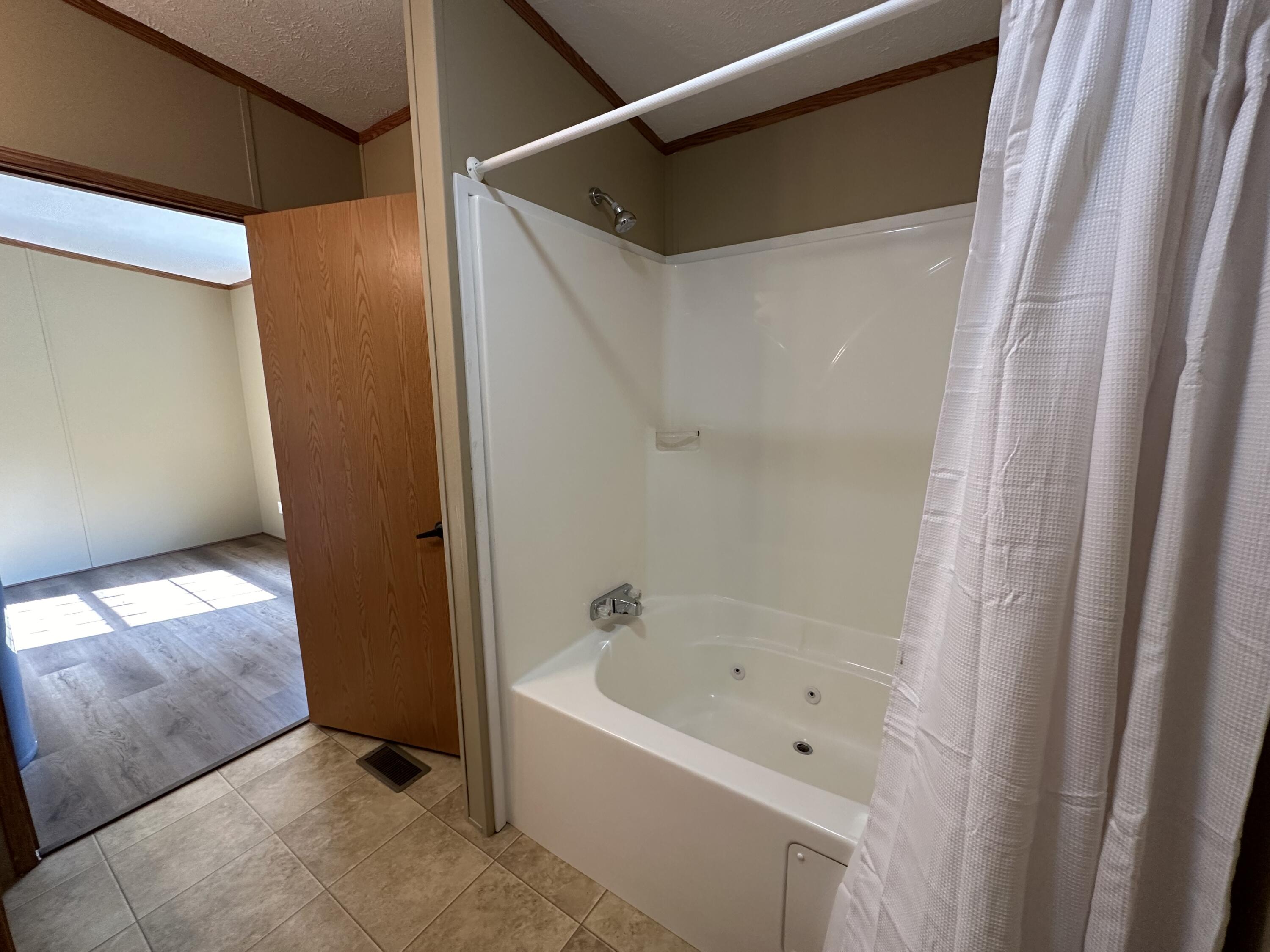 4748 West Woodrow Road Shelby, MI 49455 - Photo 25 of 26 Primary Bath