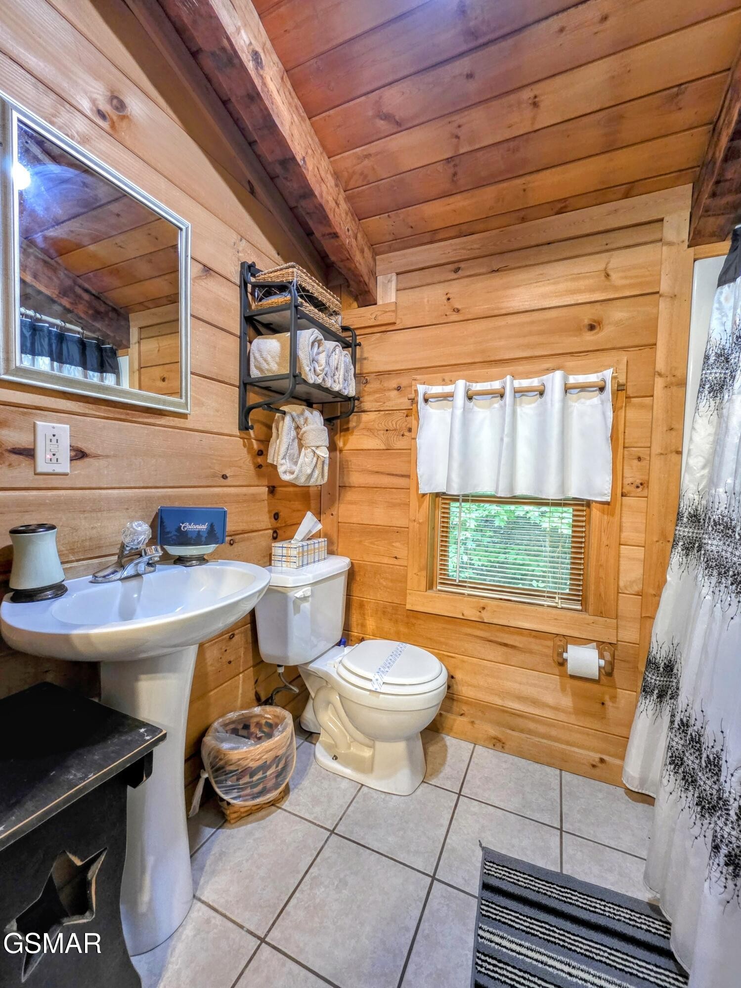 2570 Pittman Center Road Sevierville, TN 37876 - Photo 52 of 61 a bathroom with a sink a toilet and a bathtub