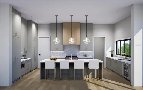 a large kitchen with a table and chairs