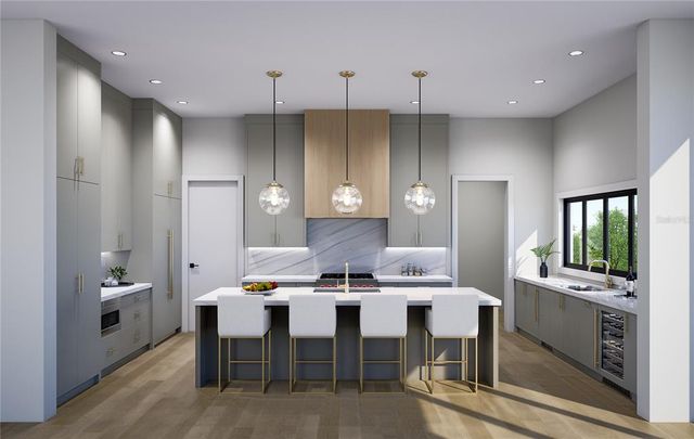 a large kitchen with a table and chairs