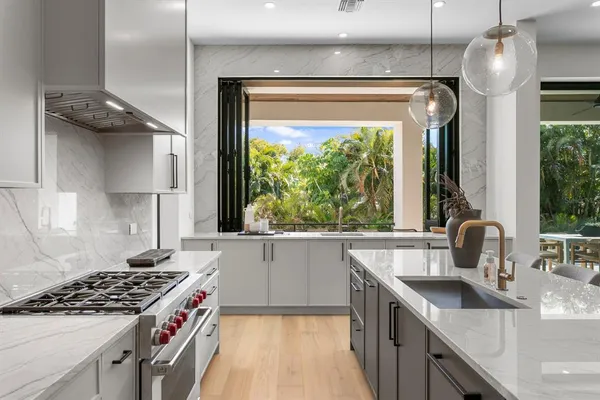a bedroom with a large bed and a large window