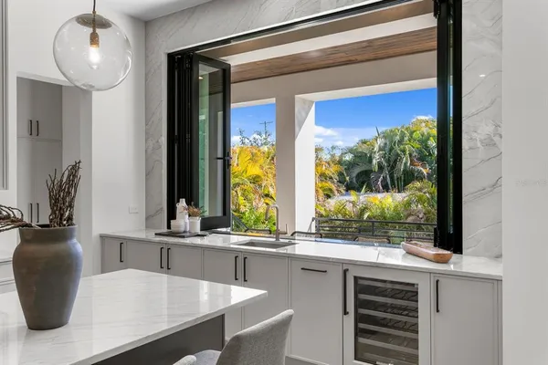 a bathroom with a double vanity sink and mirror