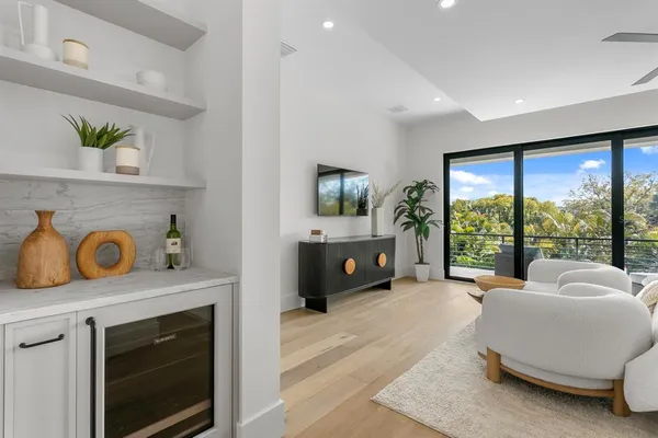 a bathroom with a mirror and a sink