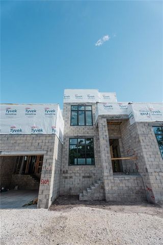an aerial view of a livingroom with fireplace