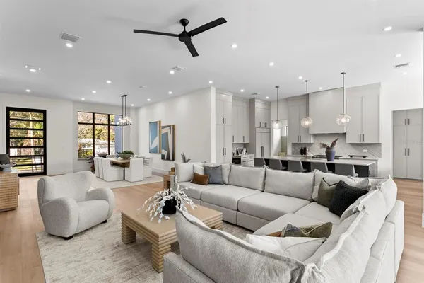 a kitchen with stainless steel appliances granite countertop a stove and a refrigerator