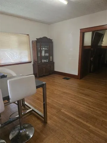 a view of a livingroom with furniture and a couch