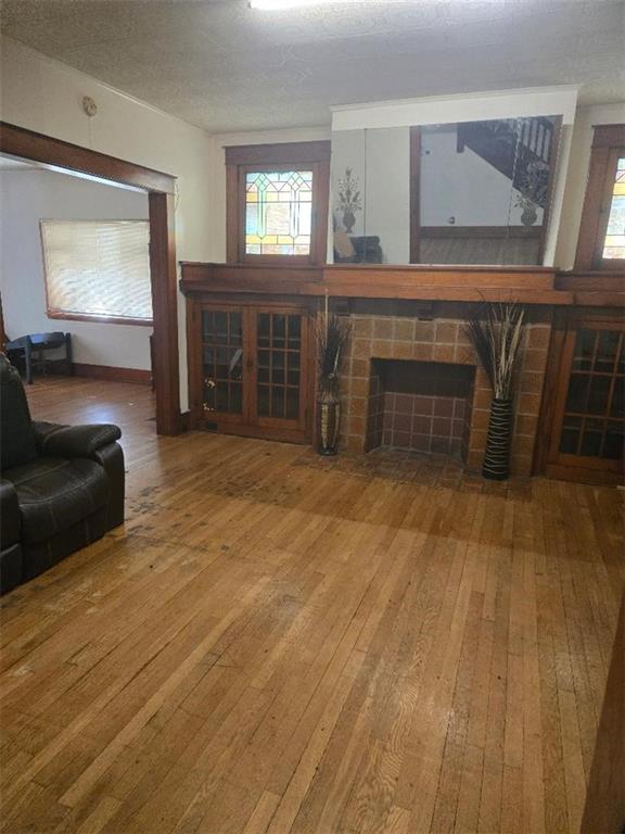615 Morgantown Road Uniontown, PA 15401 - Photo 16 of 32 a living room with furniture and a fireplace