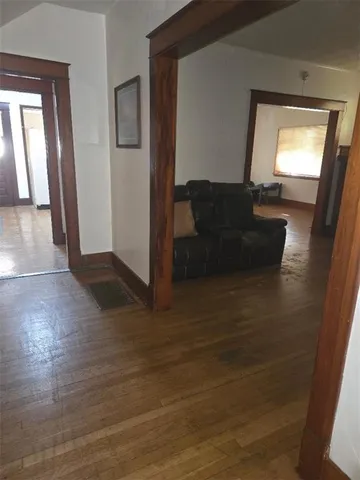 a living room with wooden floor