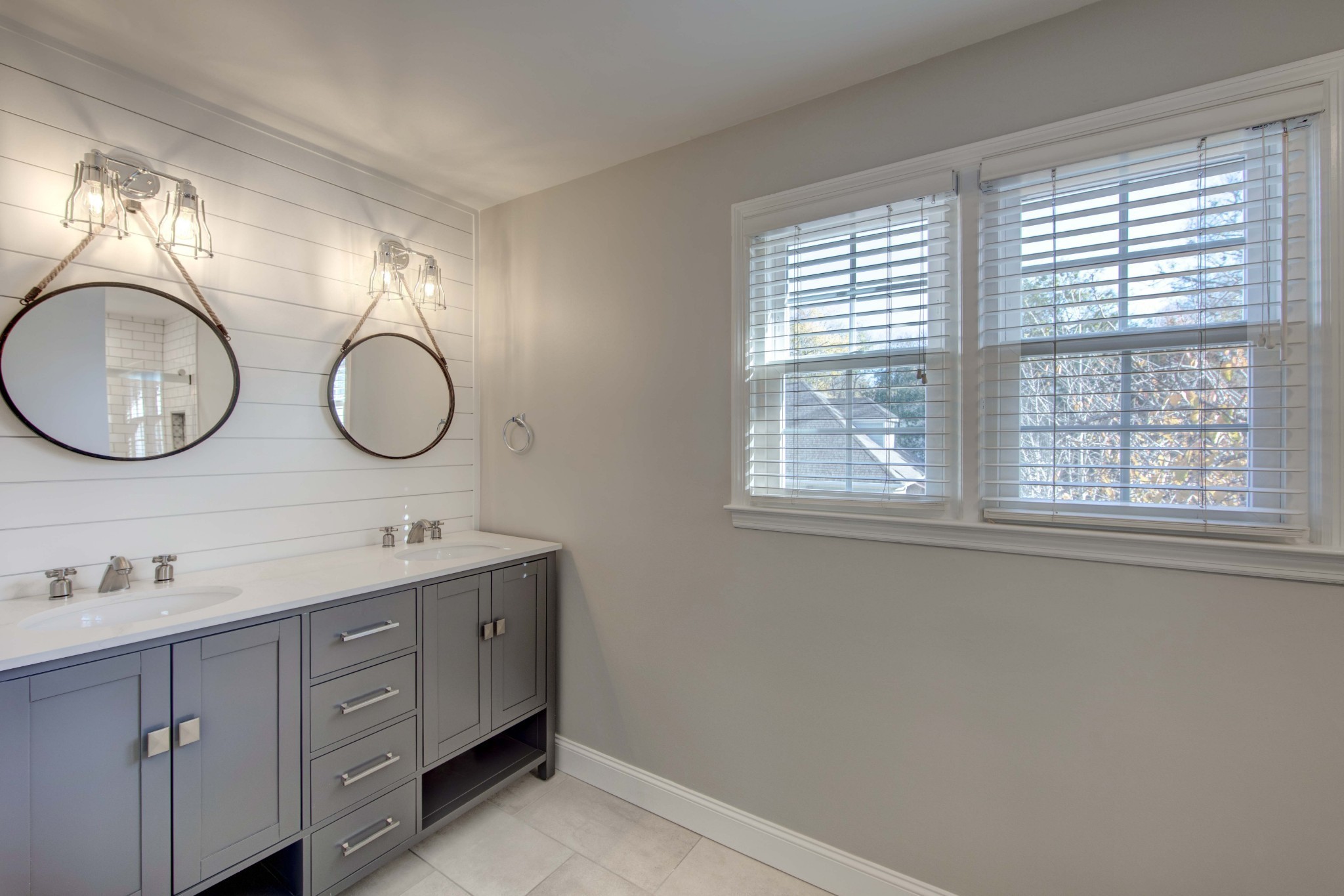 1129 West Main Street, Unit 4 Franklin, TN 37064 - Photo 16 of 27 a bathroom with 2 sink and a mirror