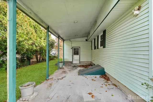 a view of a house with a back yard