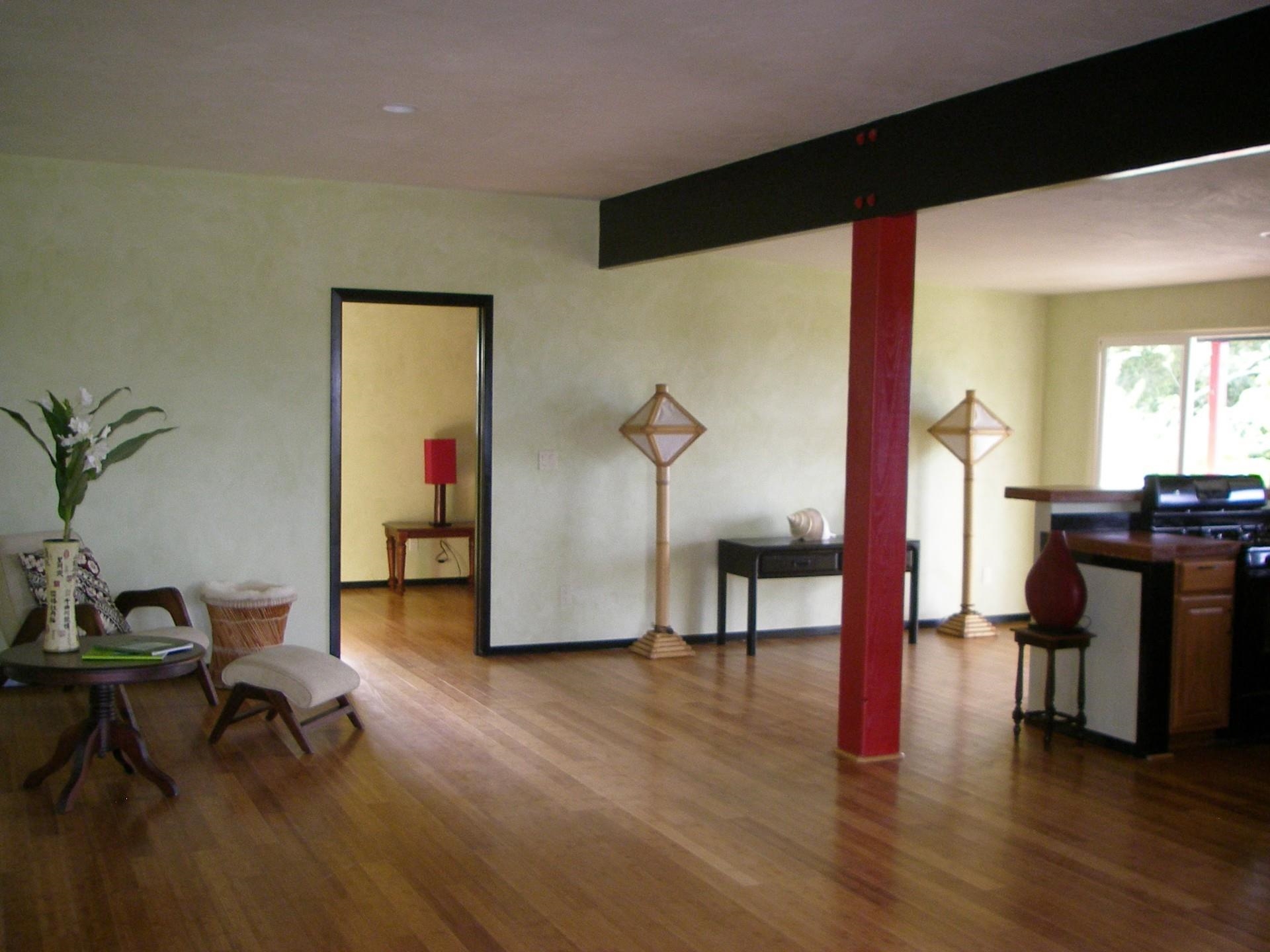 59 Door Of Faith Road Haiku, HI 96708 - Photo 24 of 45 a living room with furniture and a wooden floor