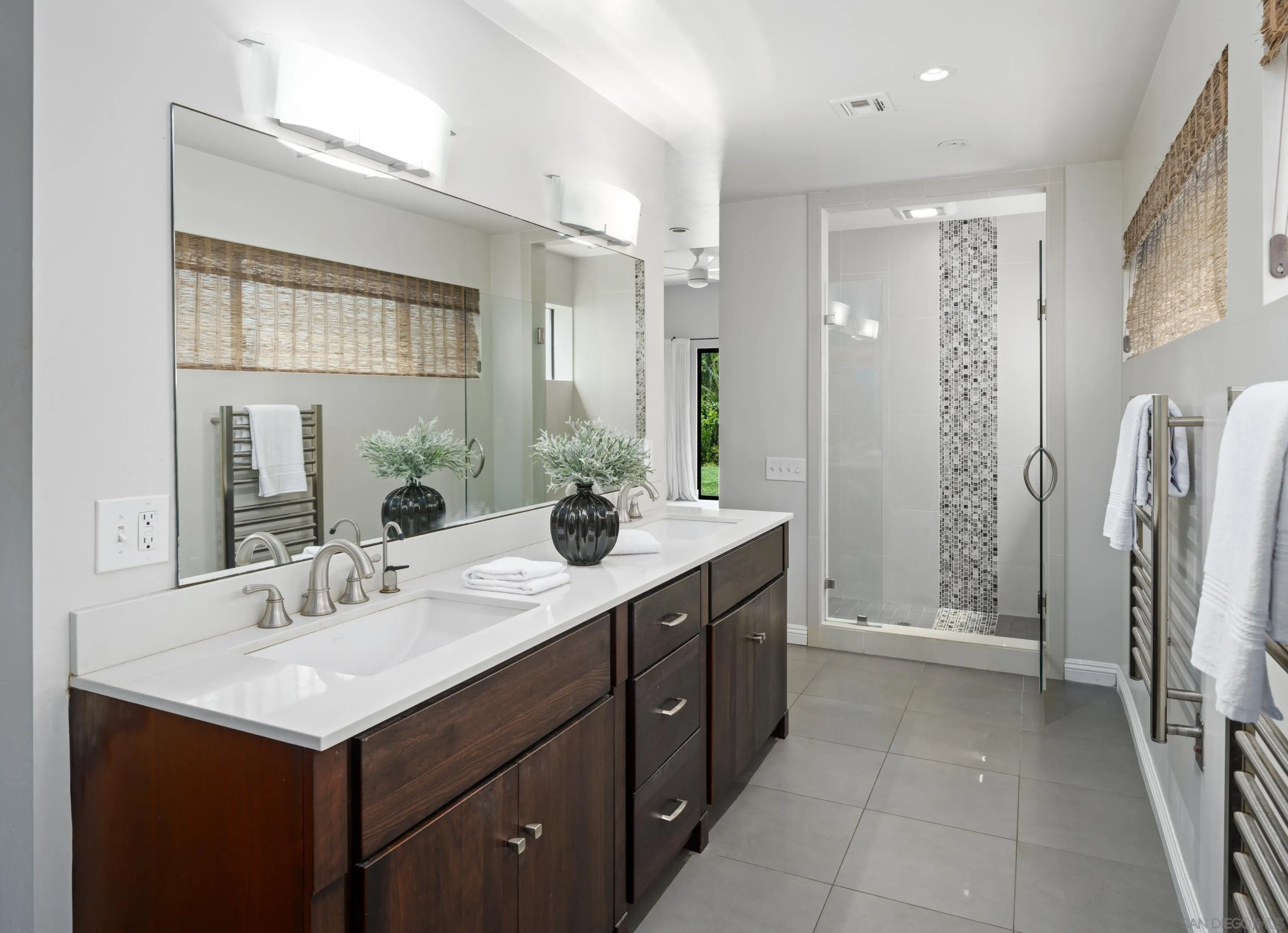 3520 Silvergate Place San Diego, CA 92106 - Photo 18 of 35 a bathroom with a sink double vanity and a mirror