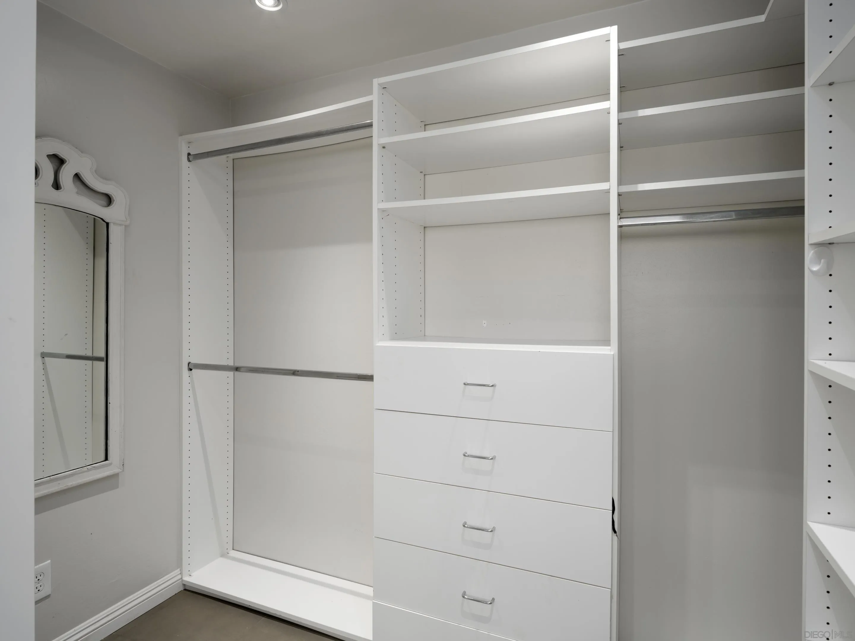 3520 Silvergate Place San Diego, CA 92106 - Photo 19 of 35 a view of walk in closet with empty racks
