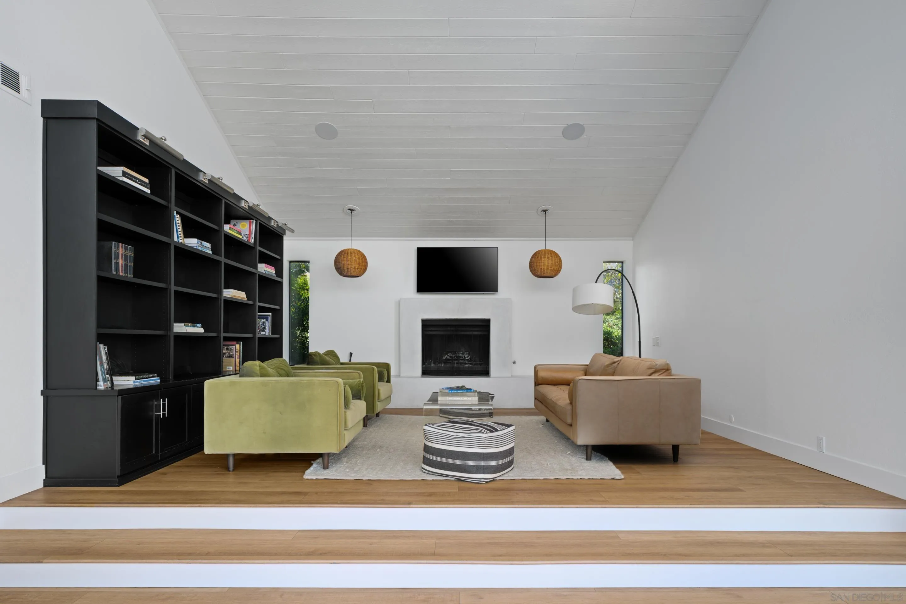 3520 Silvergate Place San Diego, CA 92106 - Photo 8 of 35 a living room with furniture and a fireplace