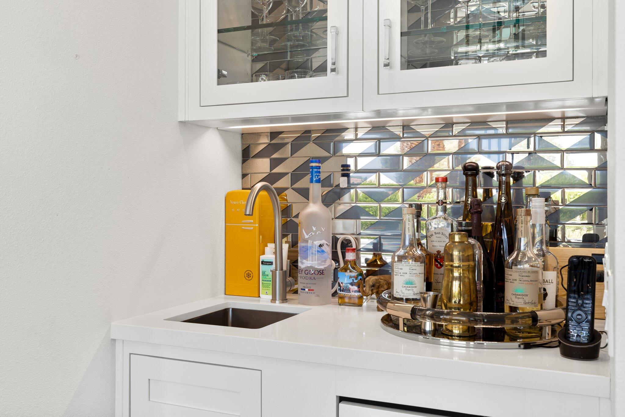 72790 Deer Grass Drive Palm Desert, CA 92260 - Photo 14 of 39 a view of a bathroom with a sink and mirror