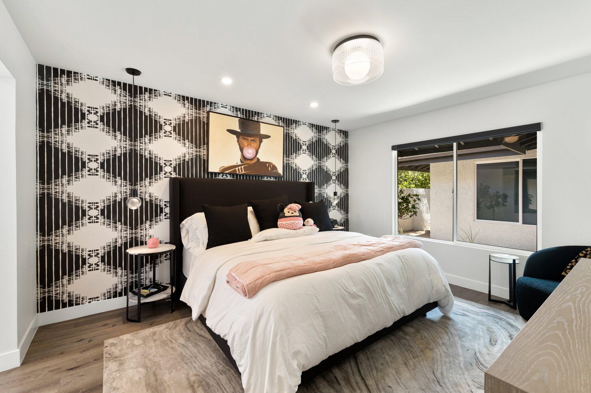 72790 Deer Grass Drive Palm Desert, CA 92260 - Photo 23 of 39 a bedroom with a large bed and a window