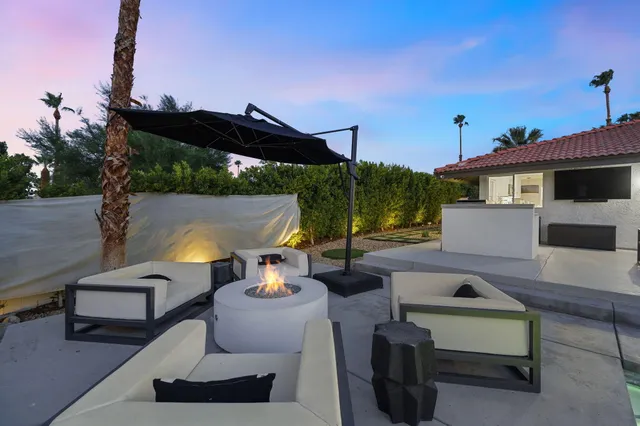 a view of outdoor space with seating area