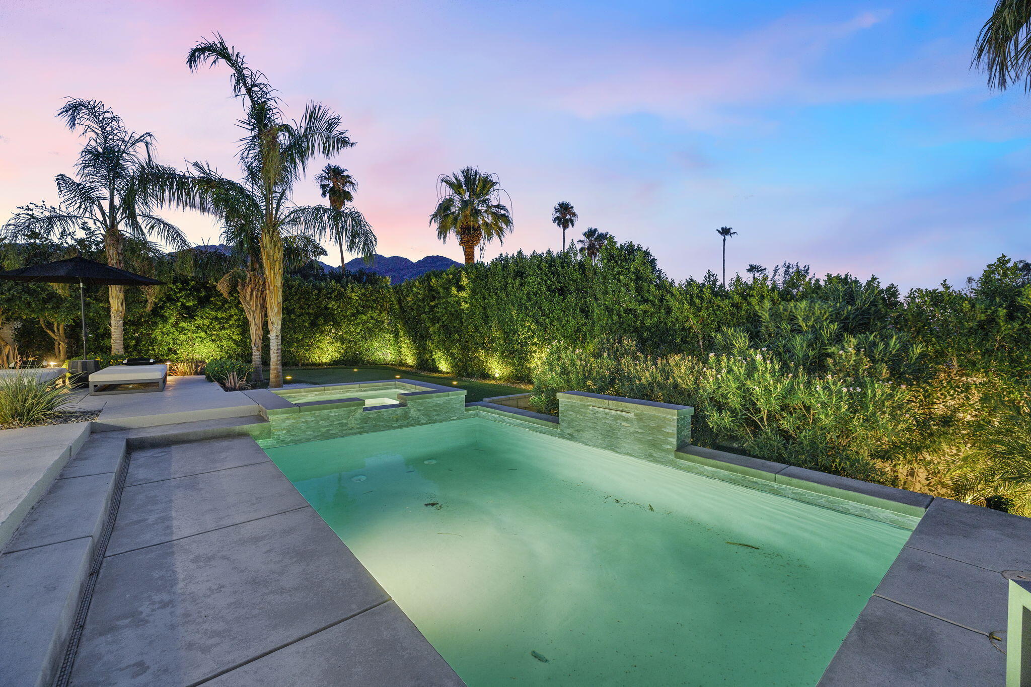 72790 Deer Grass Drive Palm Desert, CA 92260 - Photo 38 of 39 a view of a street with a houses in the background