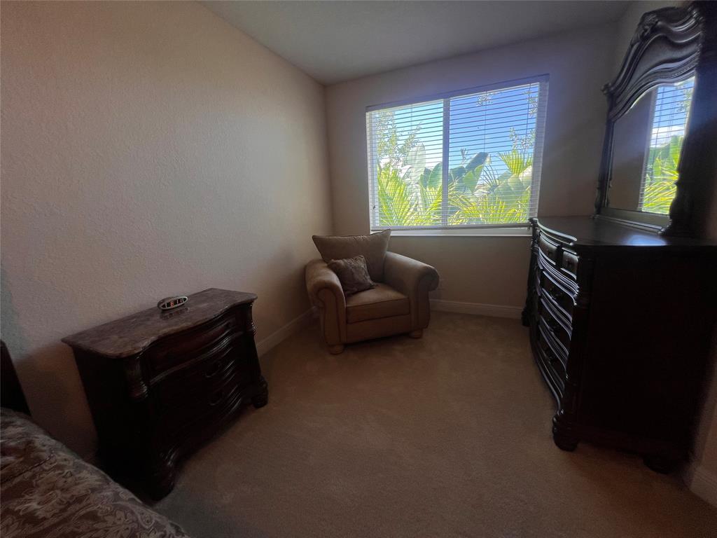 3014 Waterside Circle Boynton Beach, FL 33435 - Photo 16 of 40 a living room with furniture and a window
