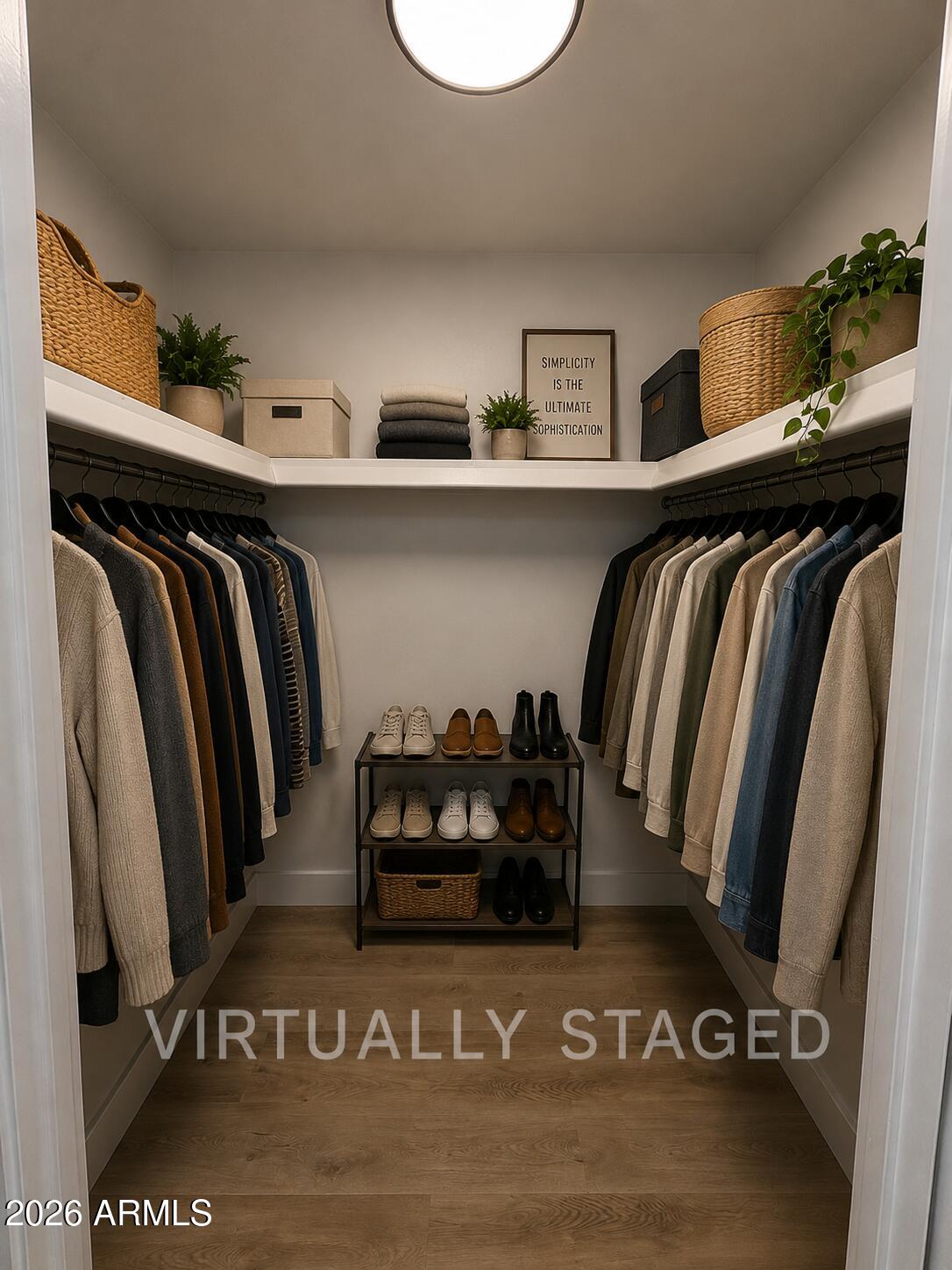 5420 North Granite Reef Road Scottsdale, AZ 85250 - Photo 15 of 30 a view of walk in closet with clothes and shoes