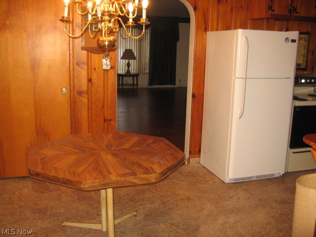 1141 Middlebury Road Kent, OH 44240 - Photo 9 of 25 EAT IN KITCHEN - DOOR LEADS TO BASEMENT - NEWER VINYL 12" BLOCK FLRG