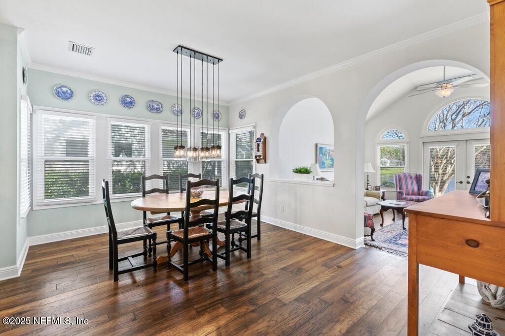 2307 Beachcomber Trail Atlantic Beach, FL 32233 - Photo 15 of 75 a view of a dining room with furniture window and wooden floor