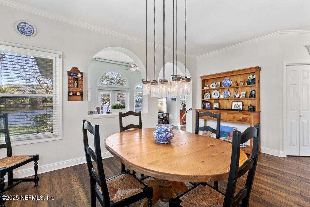 2307 Beachcomber Trail Atlantic Beach, FL 32233 - Photo 17 of 75 a view of a dining room with furniture window and wooden floor