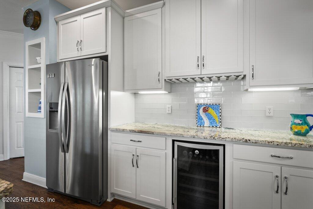 2307 Beachcomber Trail Atlantic Beach, FL 32233 - Photo 22 of 75 a kitchen with stainless steel appliances granite countertop a refrigerator and a sink