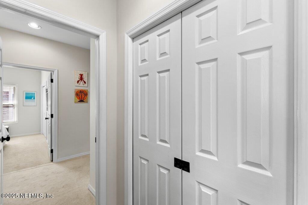 2307 Beachcomber Trail Atlantic Beach, FL 32233 - Photo 29 of 75 a view of a hallway with wooden floor