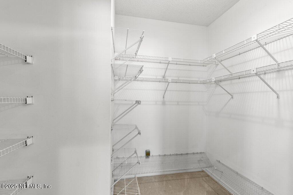 2307 Beachcomber Trail Atlantic Beach, FL 32233 - Photo 31 of 75 a view of a room with racks on the wall