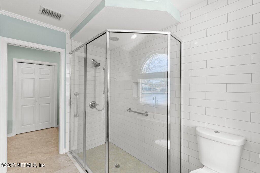 2307 Beachcomber Trail Atlantic Beach, FL 32233 - Photo 50 of 75 a bathroom that has a glass shower door