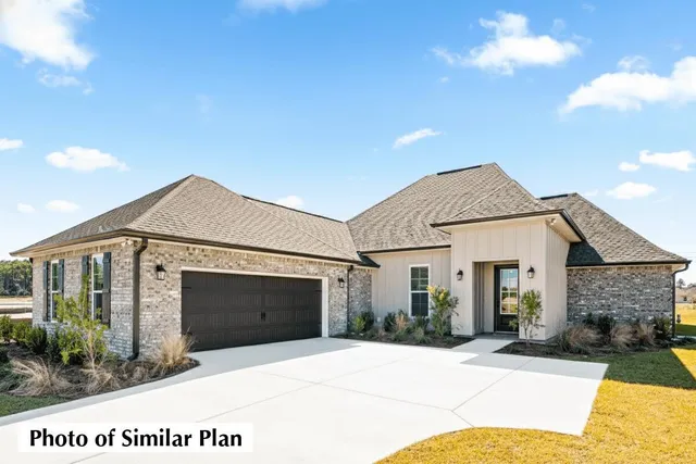 a front view of a house with yard