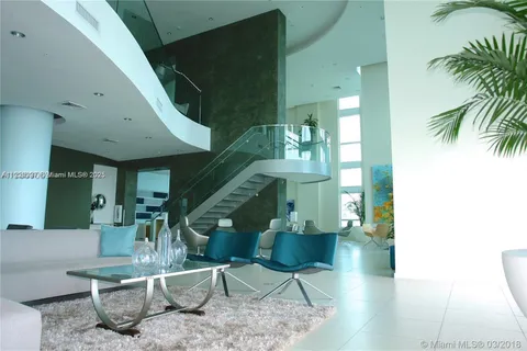 a view of a swimming pool next to a yard