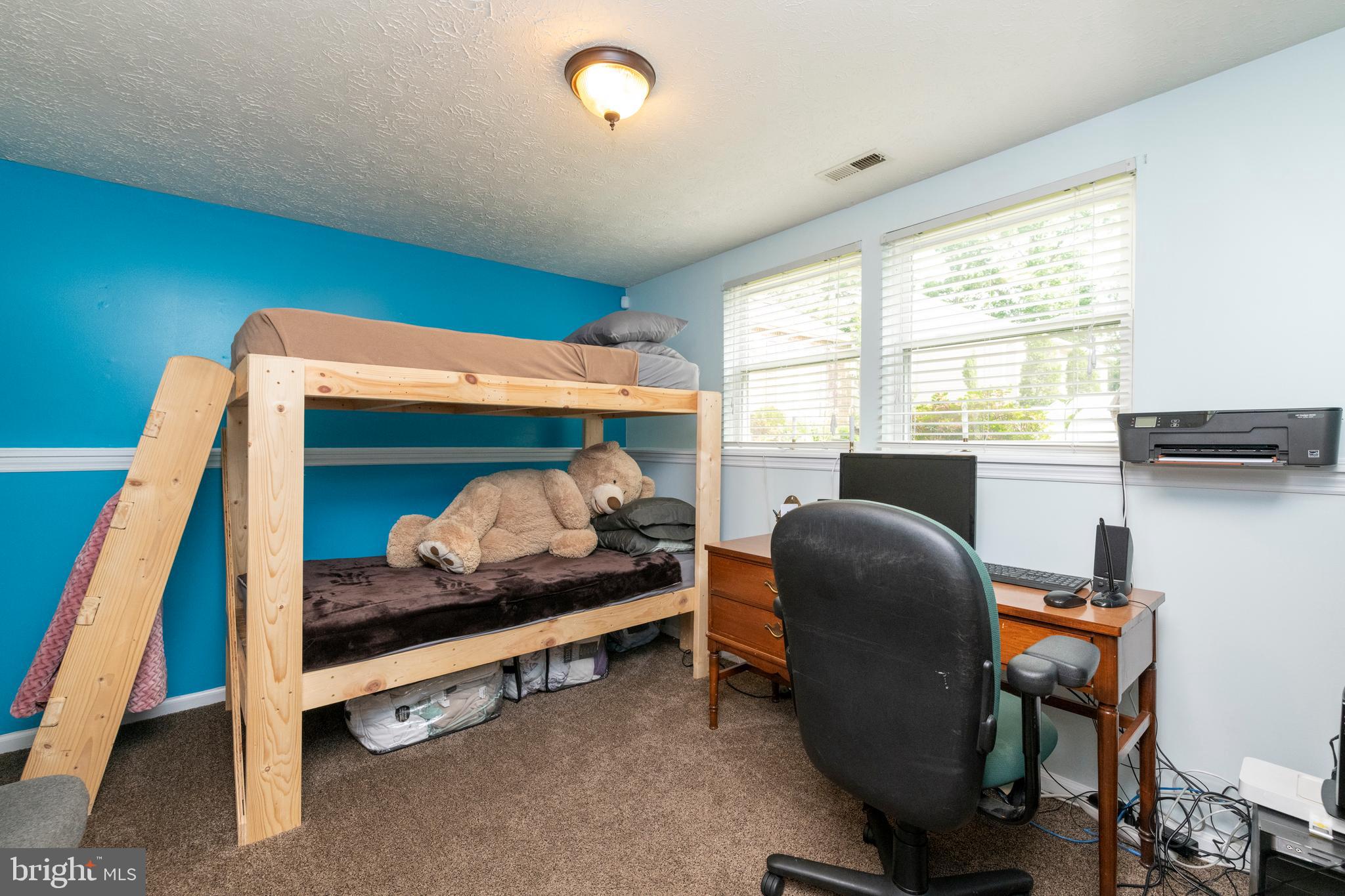8624 Lawrence Hill Road Perry Hall, MD 21128 - Photo 23 of 39 a bedroom with furniture and a window