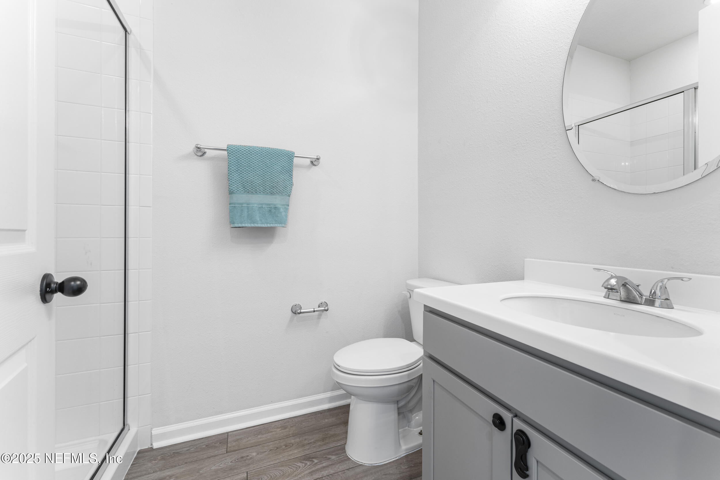 513 Sandstone Drive St. Augustine, FL 32086 - Photo 18 of 56 a bathroom with a sink toilet and shower