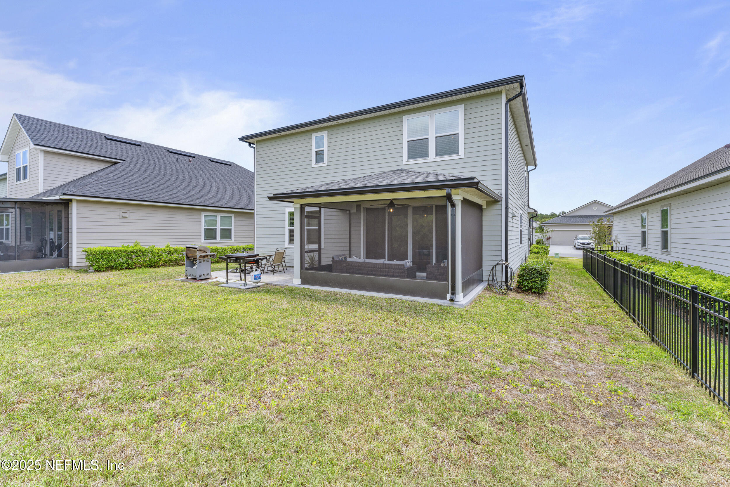 513 Sandstone Drive St. Augustine, FL 32086 - Photo 38 of 56 a view of backyard of house with green space