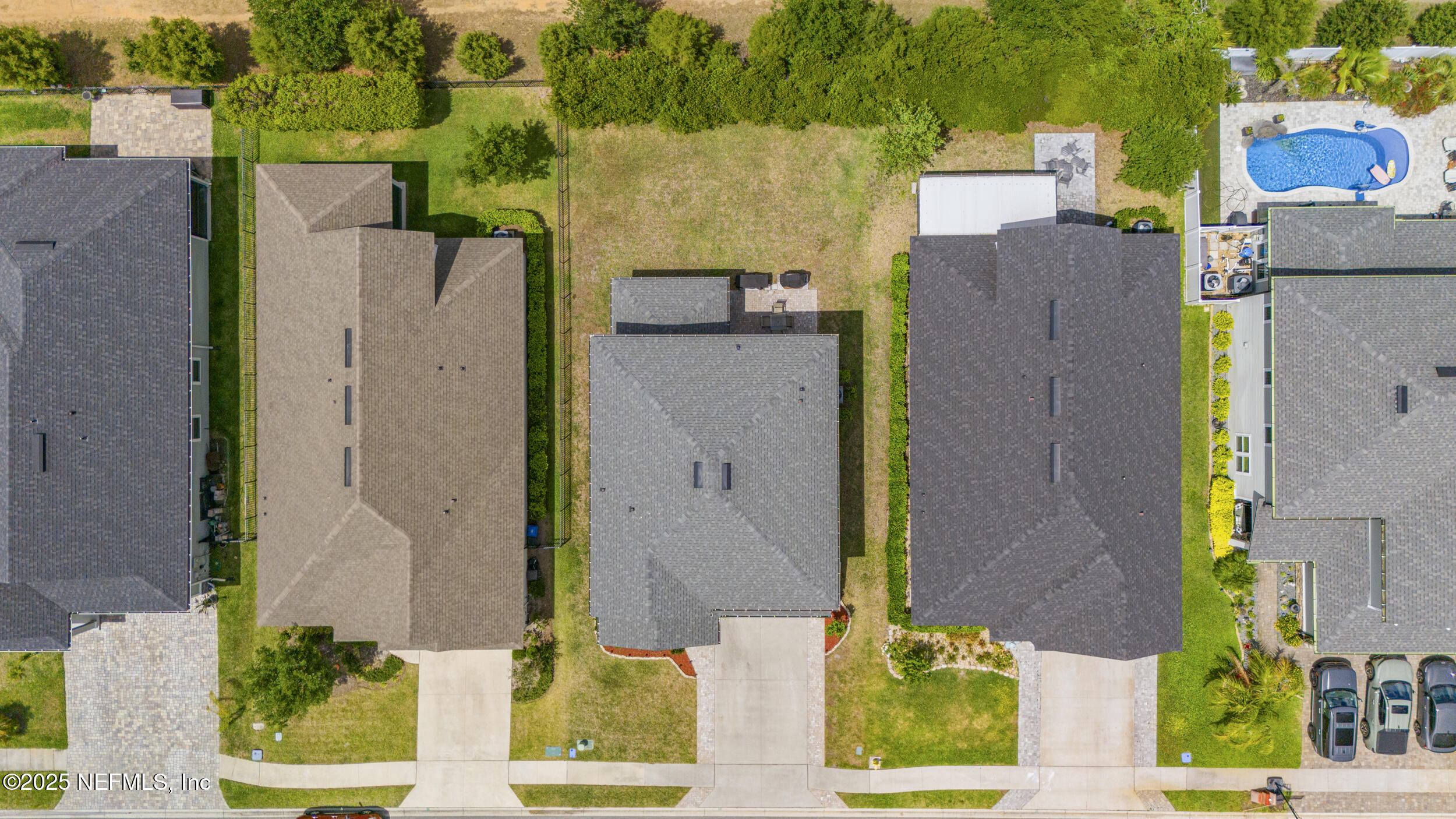 513 Sandstone Drive St. Augustine, FL 32086 - Photo 48 of 56 an aerial view of a house with a yard and large tree