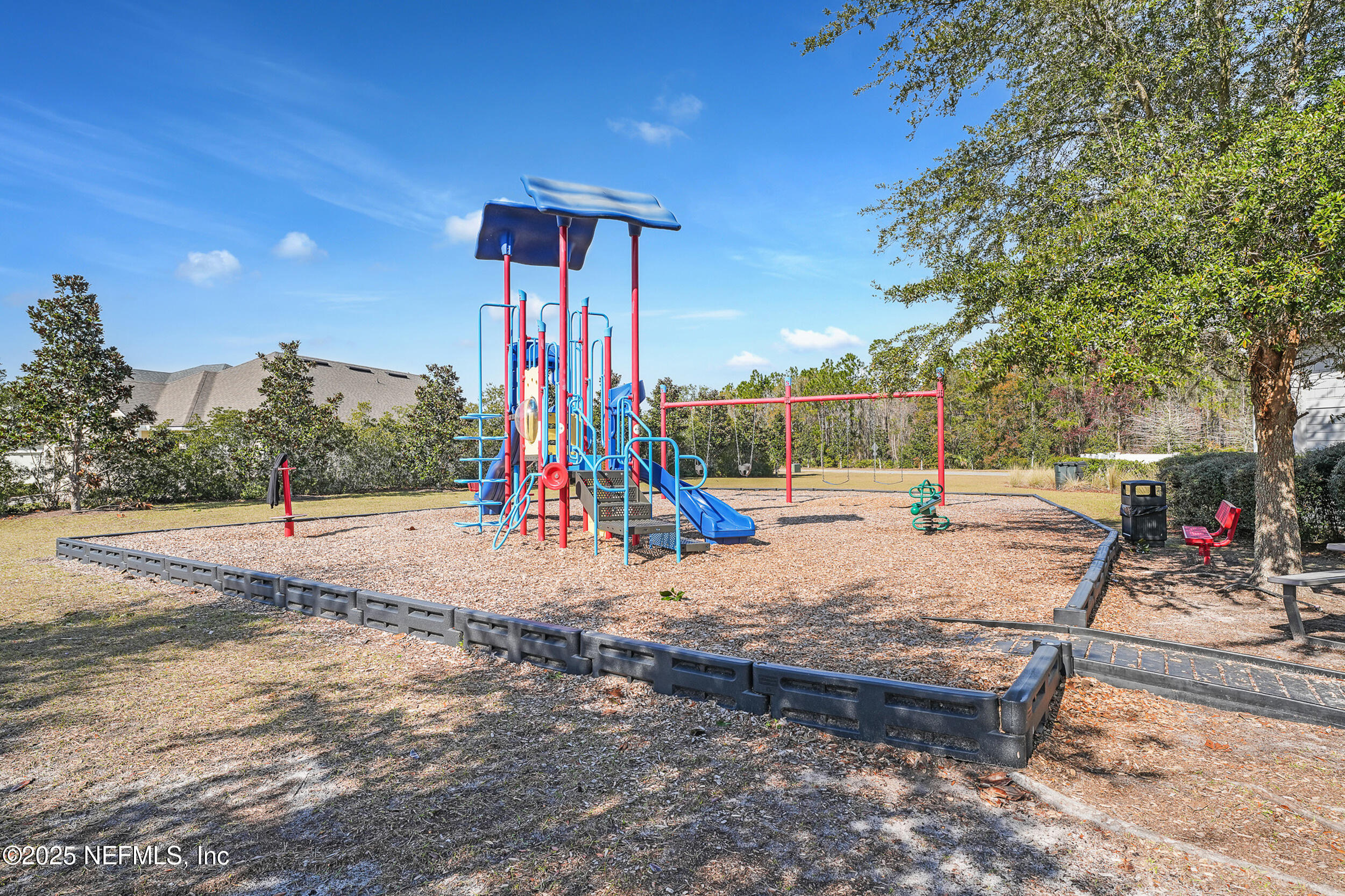 513 Sandstone Drive St. Augustine, FL 32086 - Photo 54 of 56 a view of a park with slide