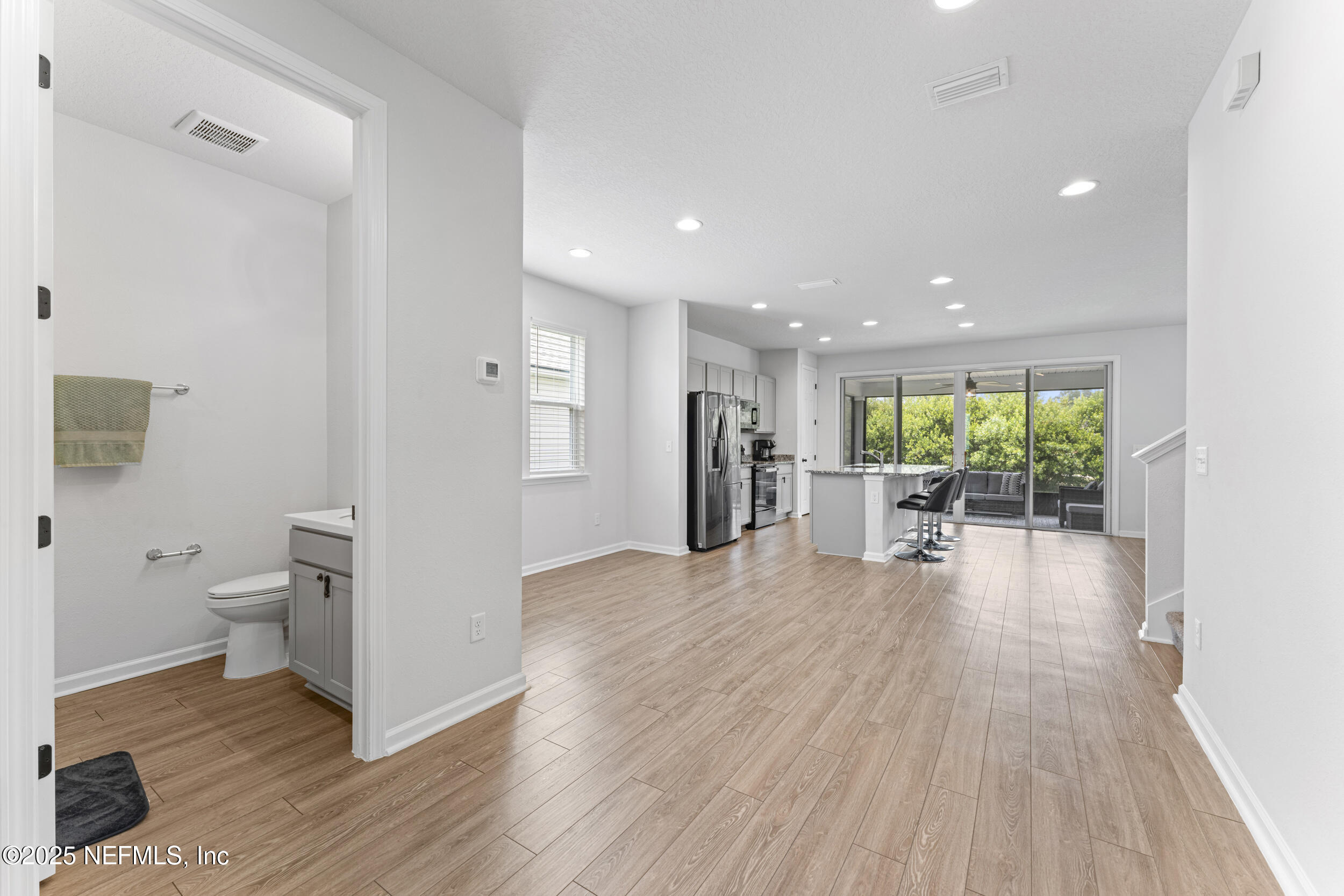 513 Sandstone Drive St. Augustine, FL 32086 - Photo 6 of 56 a living room with furniture and a wooden floor