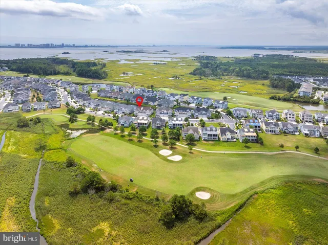 a outdoor living room with furniture and a potted plant