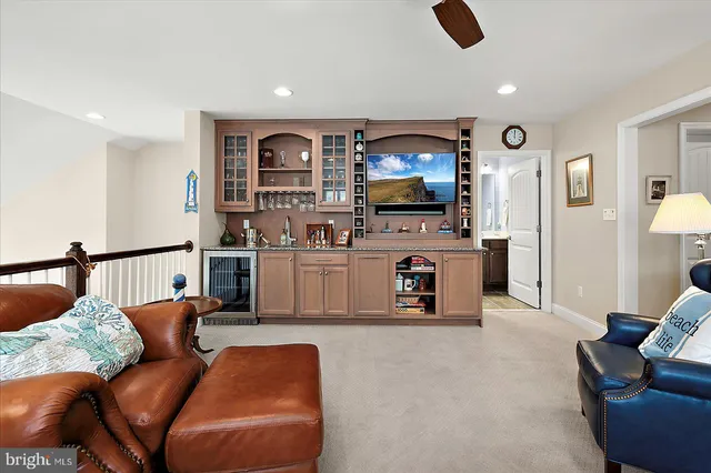 a view of a lake with a house in the background