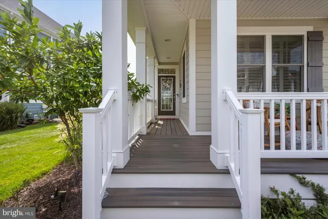a living room with fireplace furniture and a fireplace