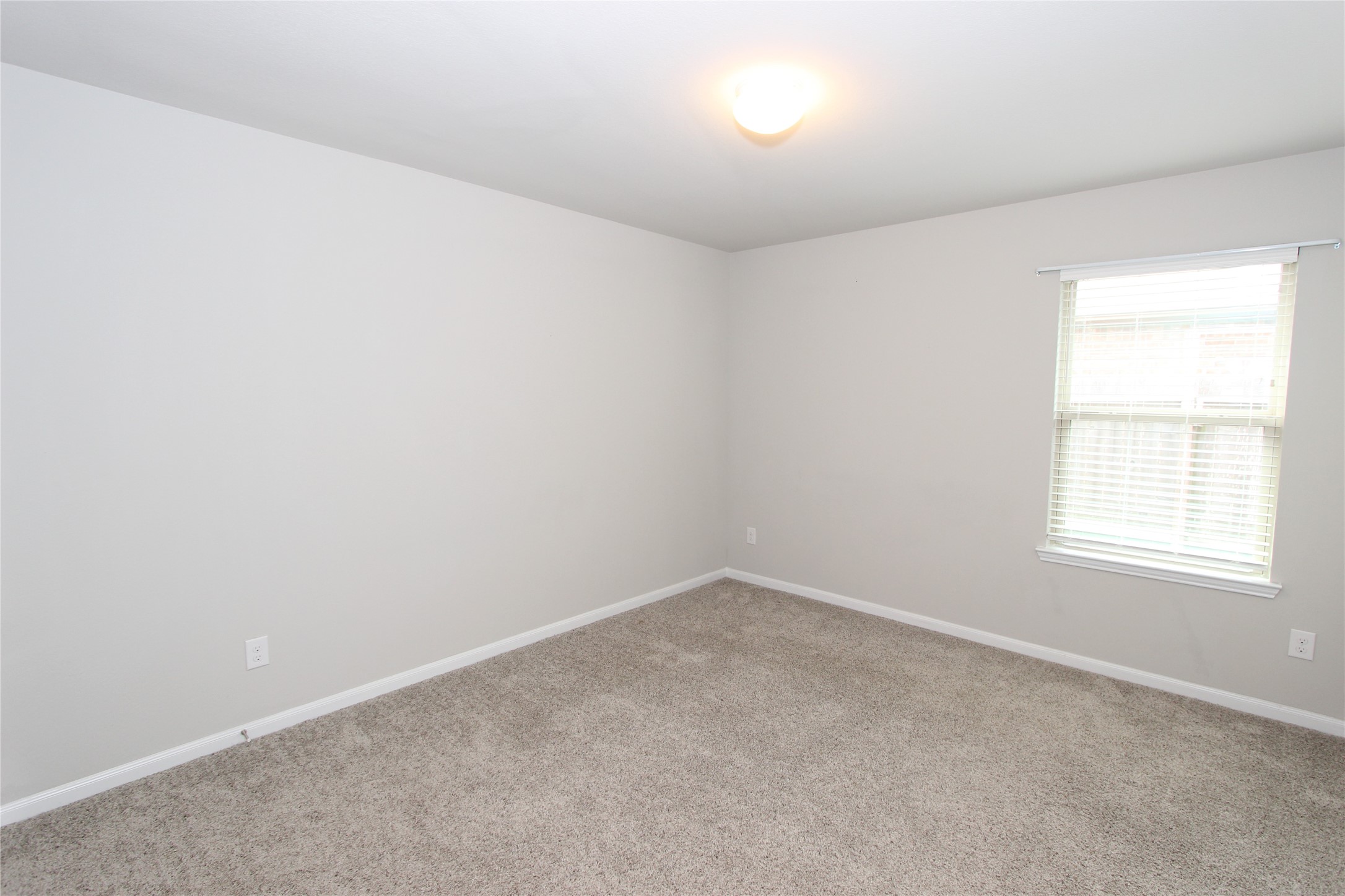 1303 Keaton Court Rosenberg, TX 77469 - Photo 16 of 22 an empty room with a window