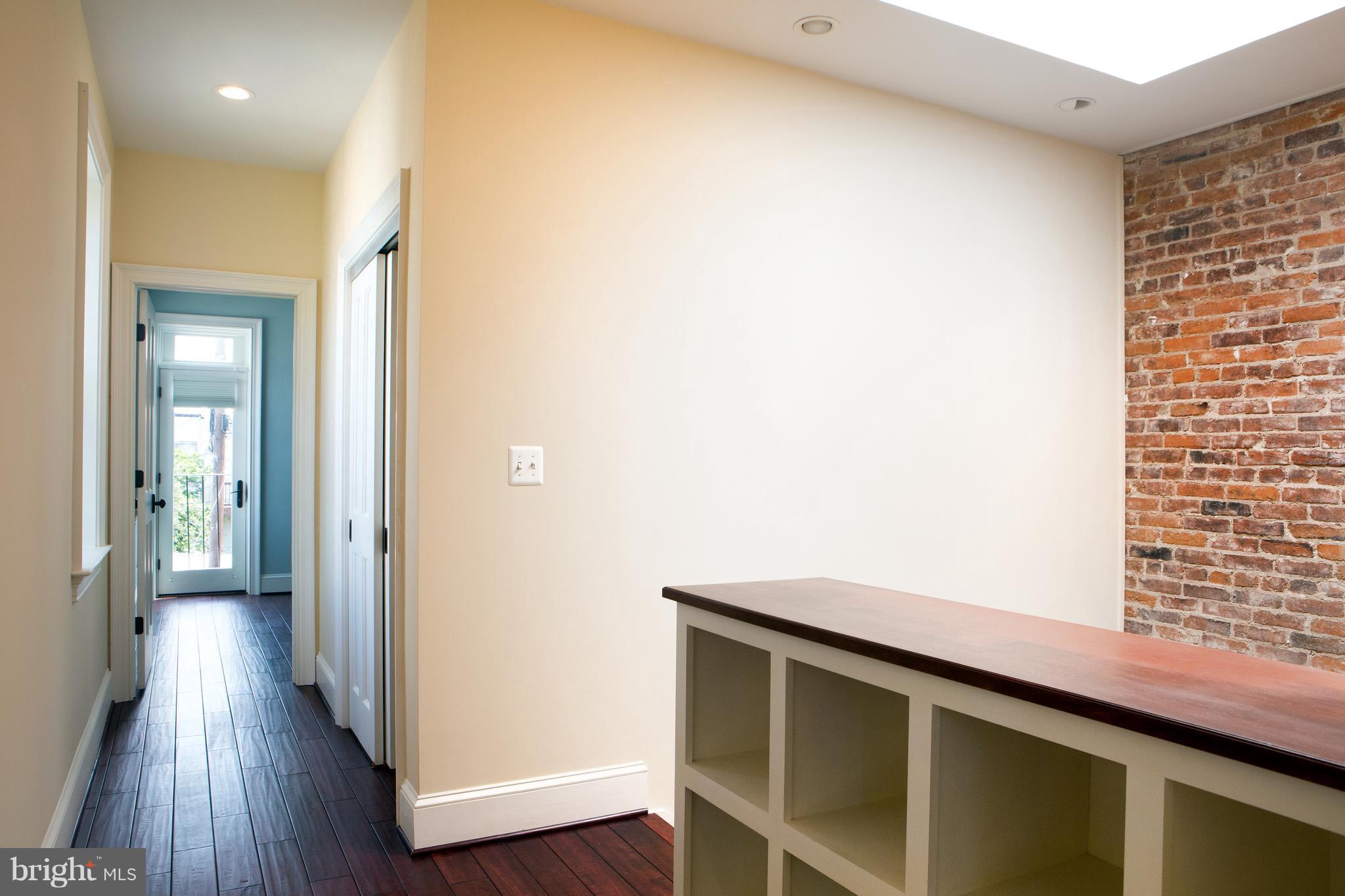 647 5th Street Northeast Washington, DC 20002 - Photo 18 of 29 Upstairs Hallway with Built-ins