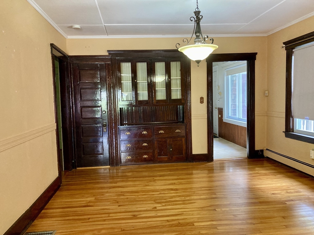 124 Bailey Road Holden, MA 01520 - Photo 11 of 37 a view of a room with window and wooden floor