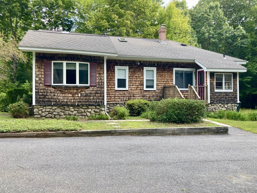 124 Bailey Road Holden, MA 01520 - Photo 3 of 37 a front view of a house with a yard