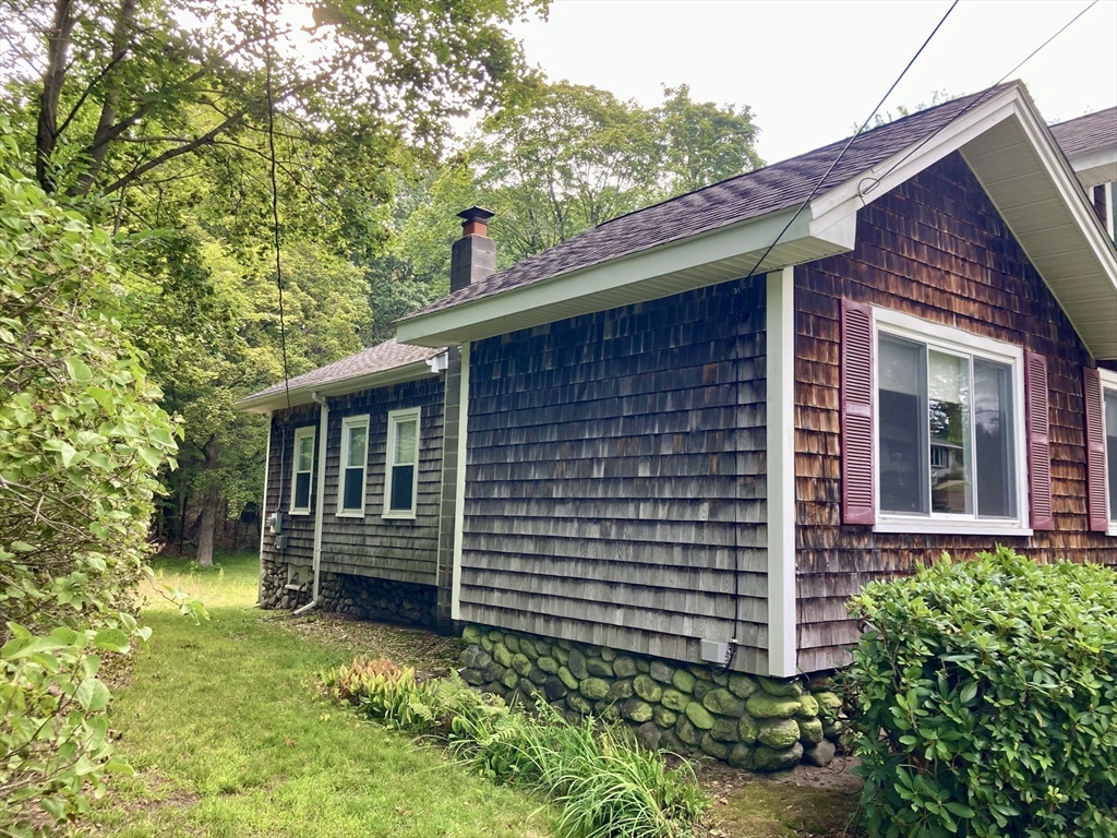 124 Bailey Road Holden, MA 01520 - Photo 6 of 37 front view of a house with a yard